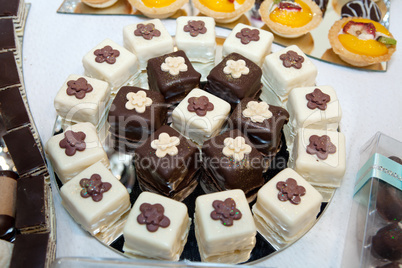 Variety of white and brown chocolate cakes