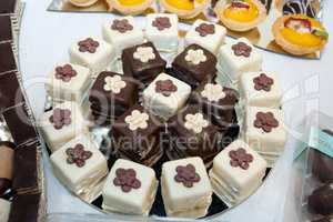 Variety of white and brown chocolate cakes