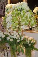 White tulips and orchids decorating the room
