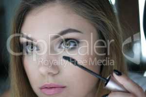 Close Up of Woman Applying Make Up