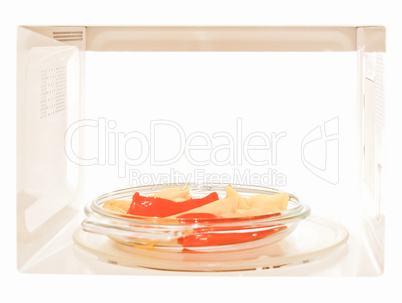 Retro looking Microwave with peppers