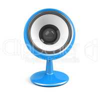 blue speaker on pedestal over white