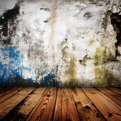 old grunge wall and wooden floor in a room
