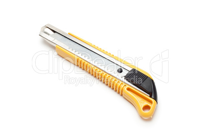 yellow paper-knife isolated over white background