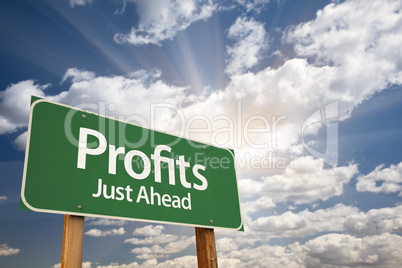 Profits Green Road Sign Over Clouds