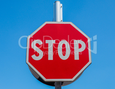 Stop sign over blue sky