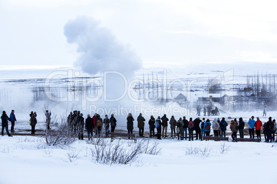 Visitors at the geyser erruption of Strokkur, Iceland
