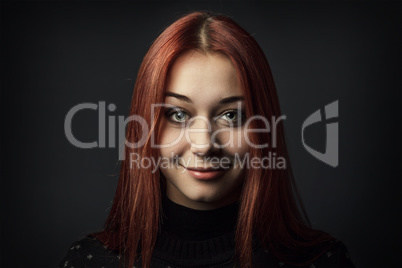 young woman over dark grey background