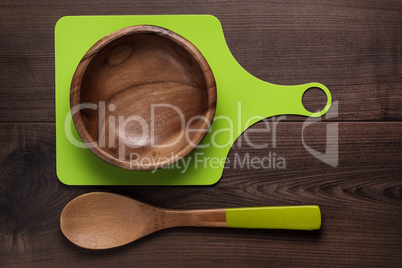 empty salad bowl and two spoons