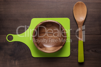 empty salad bowl and two spoons