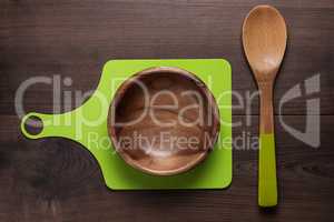 empty salad bowl and two spoons