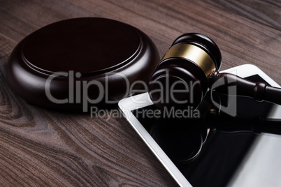 judge gavel and tablet computer
