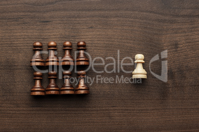 chess uniqueness concept over grey background