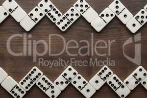 domino pieces on the wooden table background
