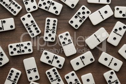 domino pieces on the wooden table background