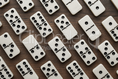 domino pieces on the wooden table background