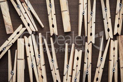 wooden clothes pegs on the table