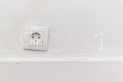 outlet on the white wall