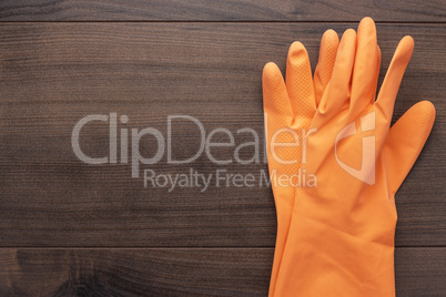 orange rubber cleaning gloves