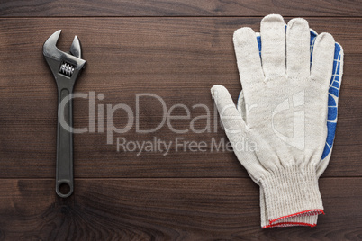 adjustable wrench and gloves