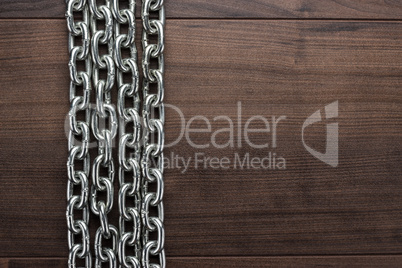 big chains on the wooden background