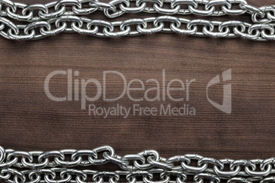 big chains on the wooden background