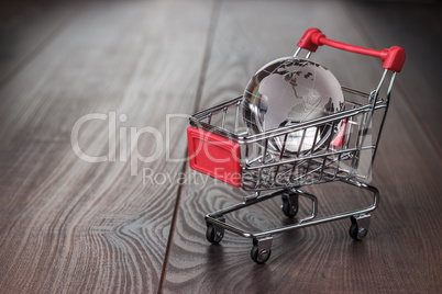 glass globe in the shopping trolley concept