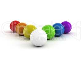 rainbow colored balls and one white