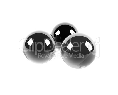 three black glass spheres