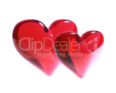 two red glass hearts isolated