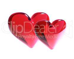 two red glass hearts isolated