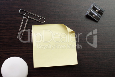 blank sticker and stationery on brown table