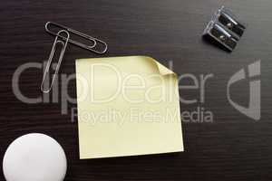 blank sticker and stationery on brown table