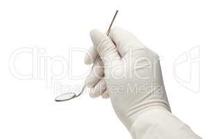 hand holding mirror isolated over white. dentist examination