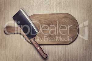 knife and cutting board used condition stylized