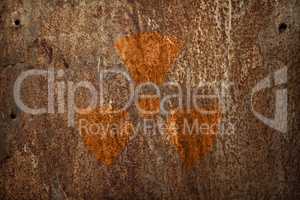 nuclear radiation sign on rusty metal texture