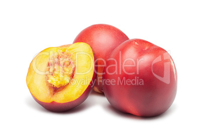 ripe nectarines on white background