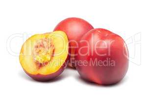 ripe nectarines on white background