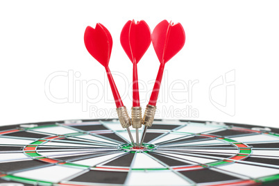three darts hit the dead centre of target