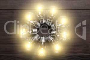 glowing bulbs on wooden background