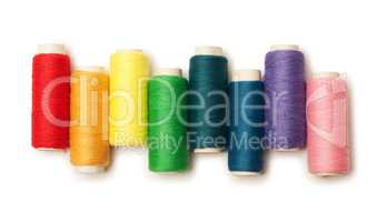rainbow colored set of threads isolated over white