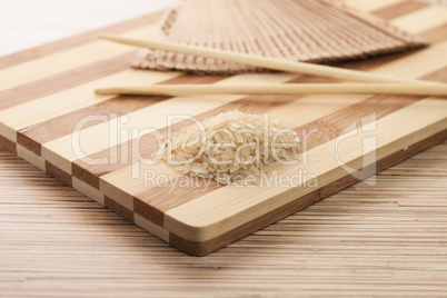 raw rice ready to be cooked on the breadboard