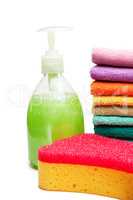 colorful towels, liquid soap and shower sponge isolated over whi