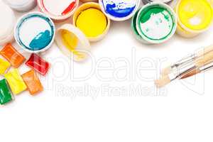 gouache paint, watercolours and brushes isolated over white back