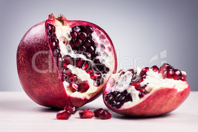 granatum on table over grey background