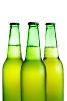green beer bottles isolated on the white