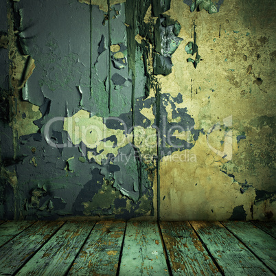 grunge painted wall and wooden floor in a room