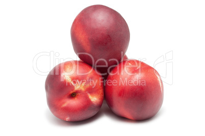 ripe nectarines isolated on white background