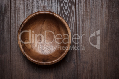 salad bowl on the  brown wooden table