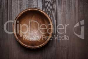 salad bowl on the  brown wooden table